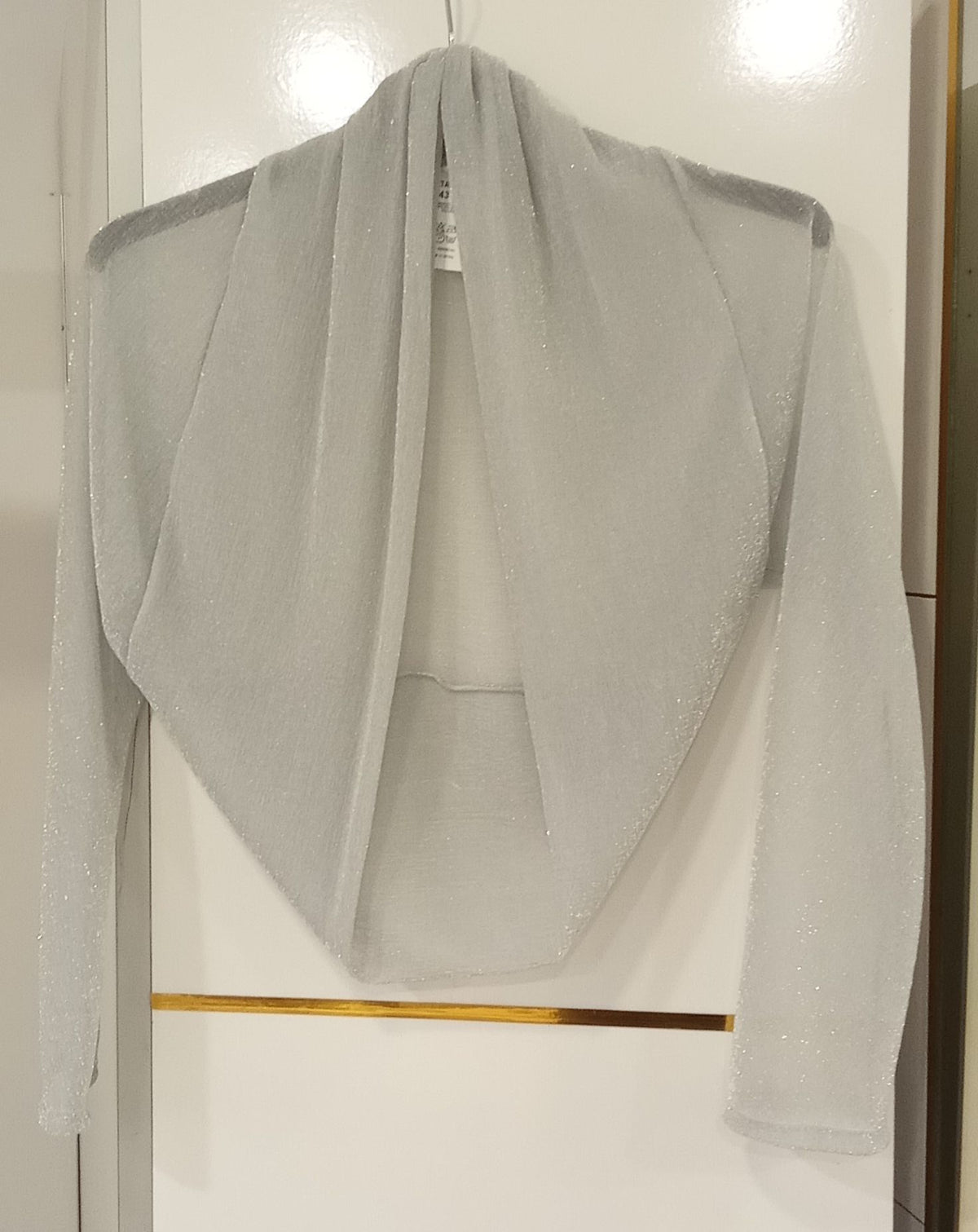 Manguito plateado de lurex de manga larga para fiesta