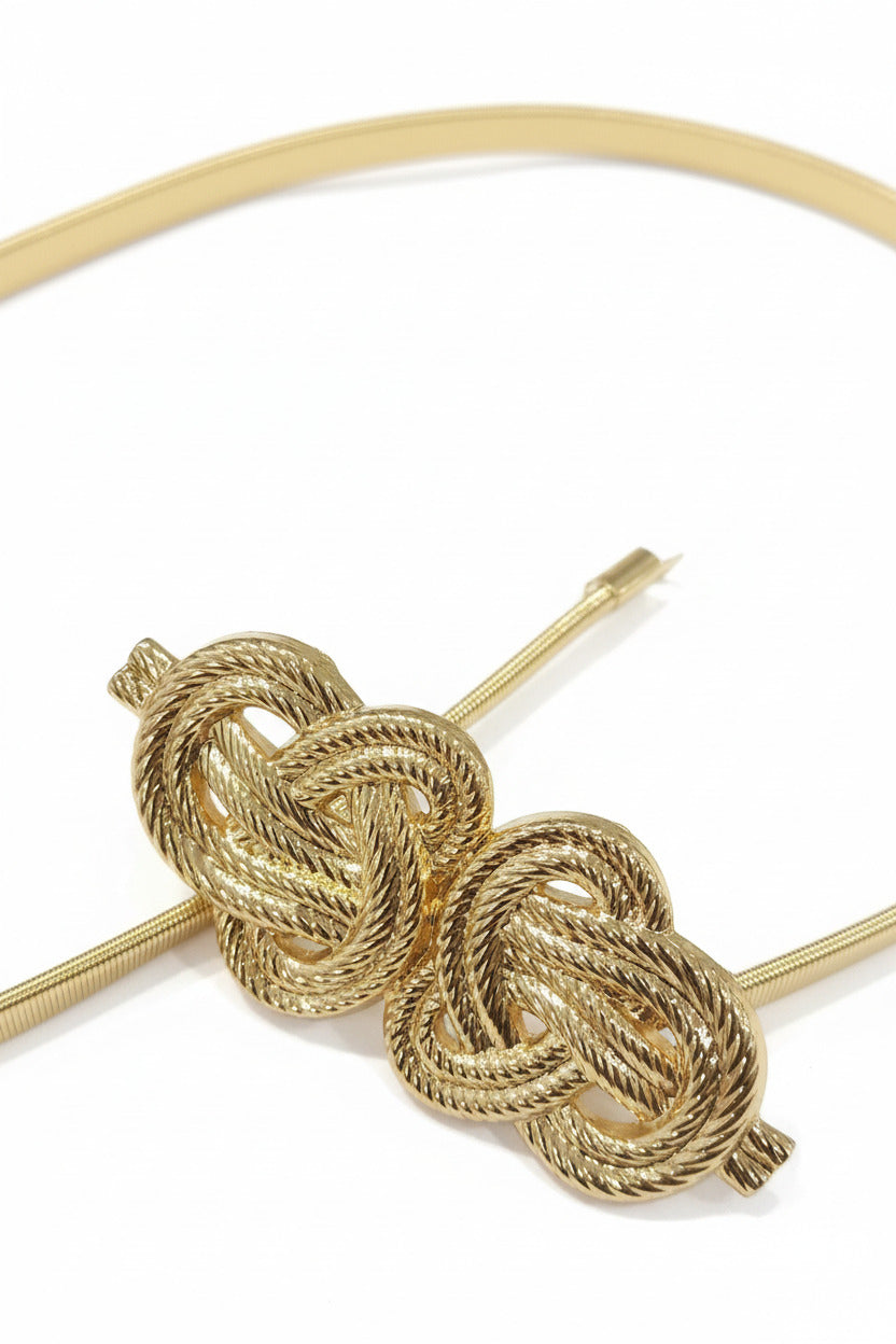 detalle cinturon dorado con hebilla decorativa para vestidos de fiesta