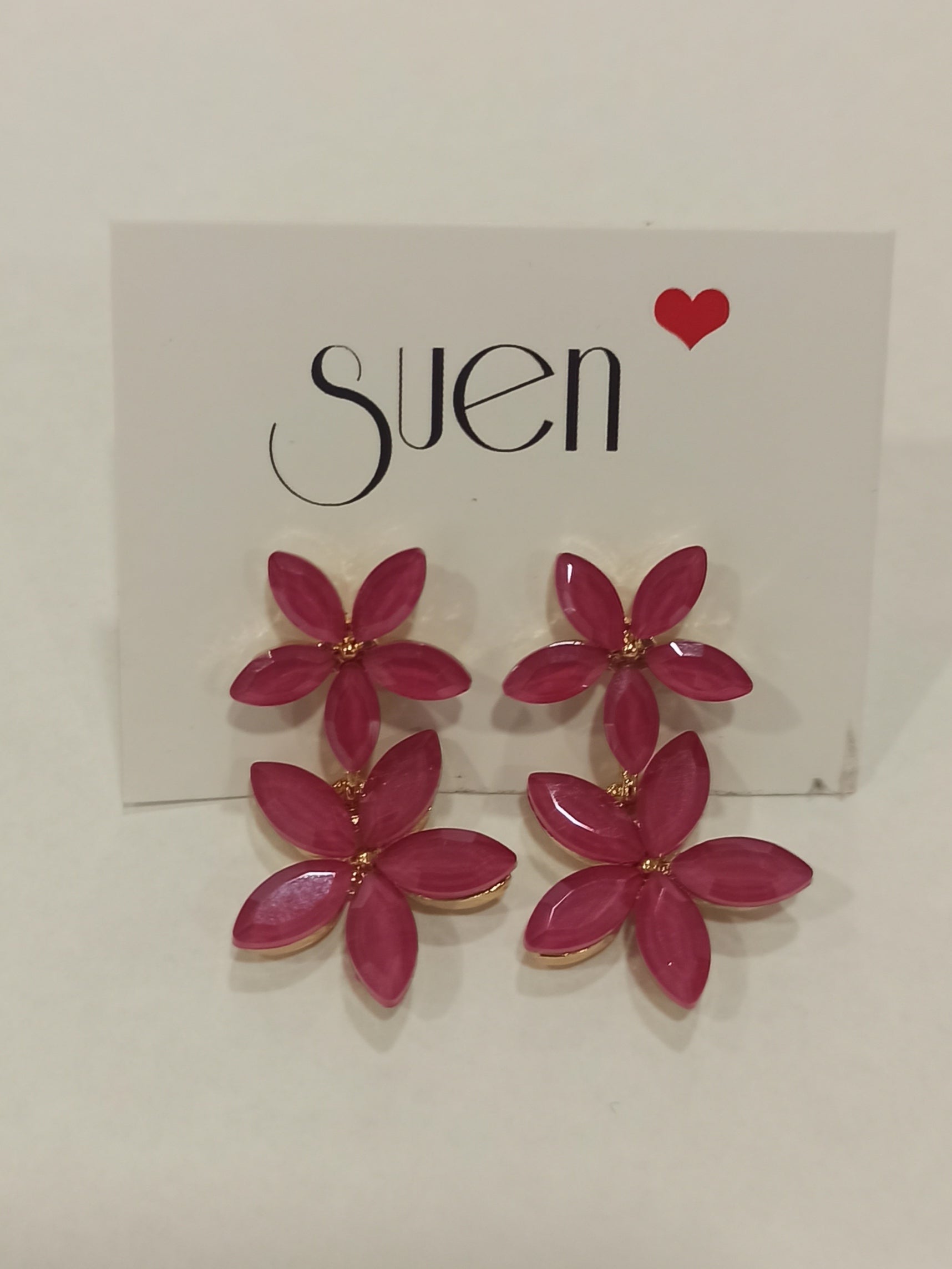 Pendientes doble flor fucsia sobre tarjeta Suen