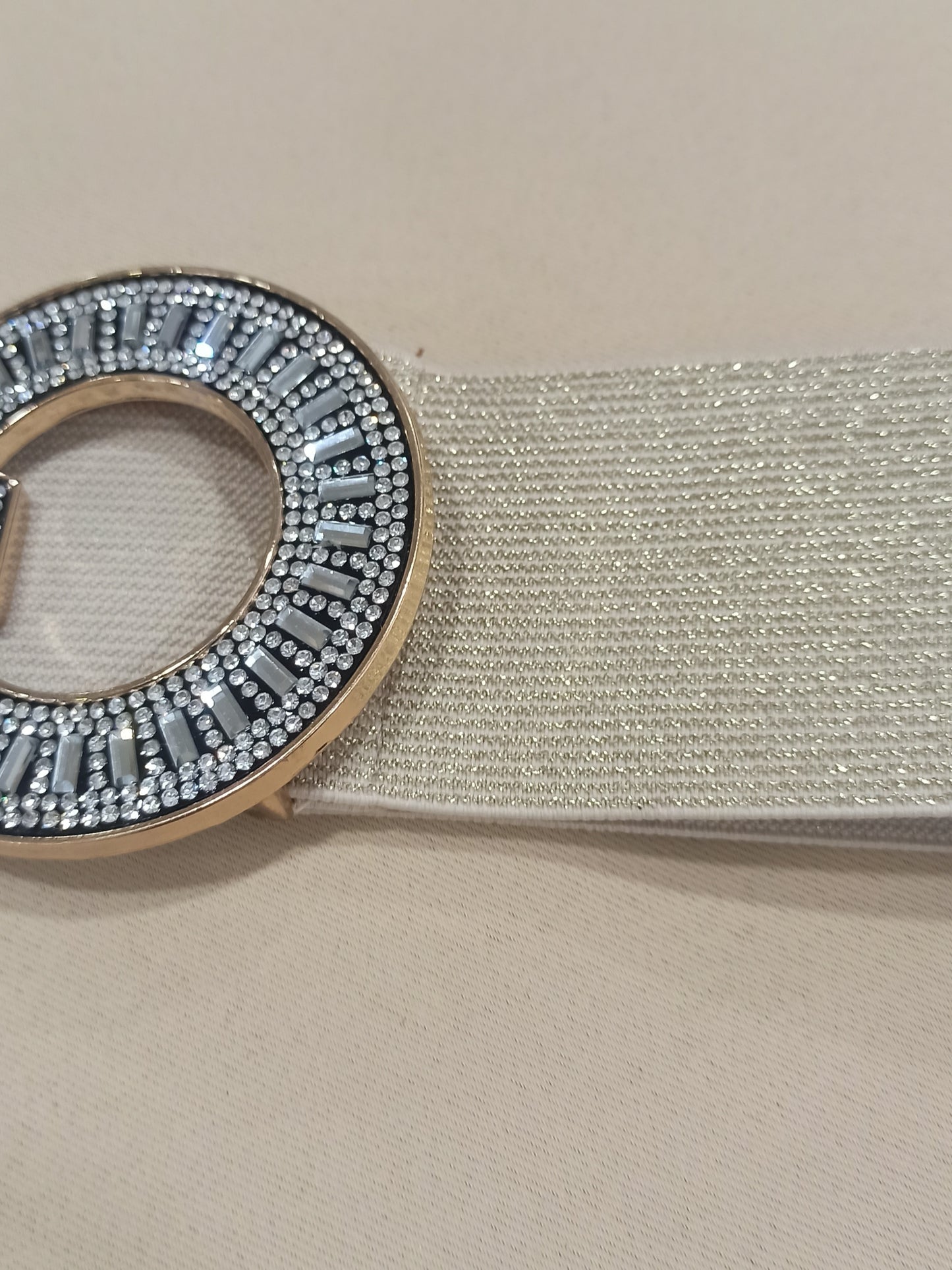Cinturón elástico dorado con hebilla de strass doble círculo