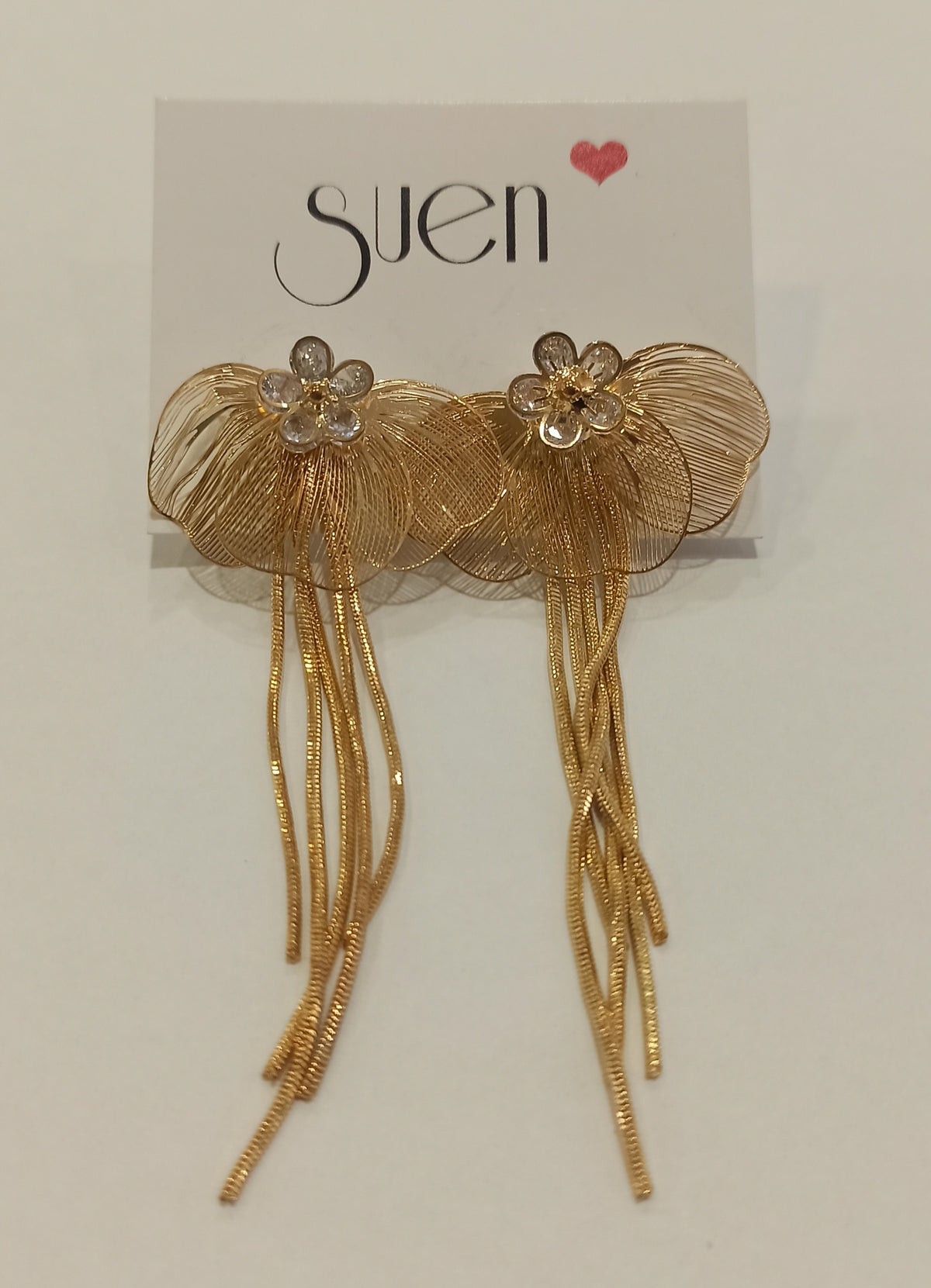 Pendientes largos dorados con flor y abanico