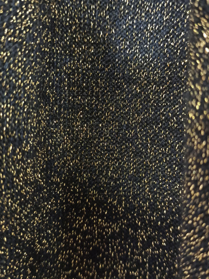 Fotografía real del pantalón palazzo jaspeado dorado