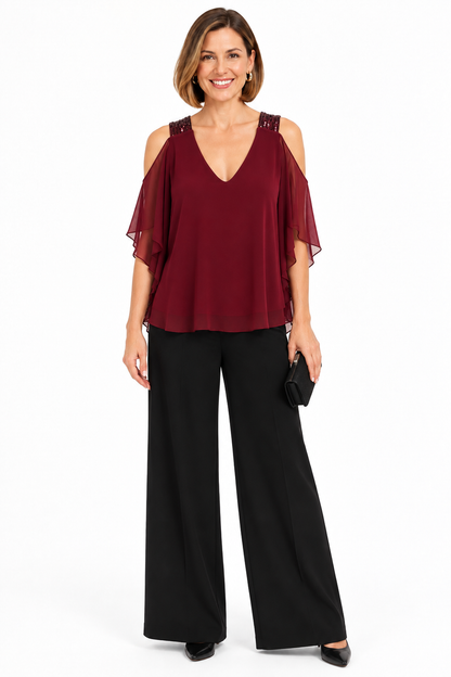 Blusa burdeos con lentejuelas y hombros descubiertos sobre , vista frontal