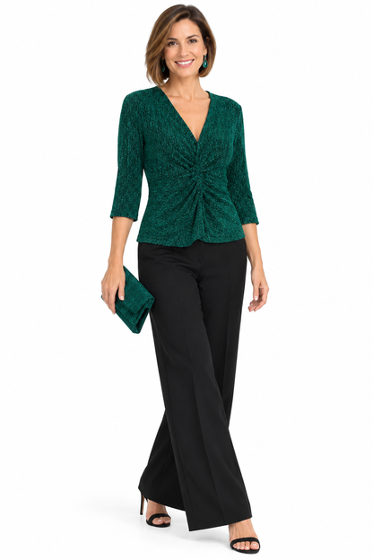 Blusa verde de lurex elástico sobre modelo, vista frontal