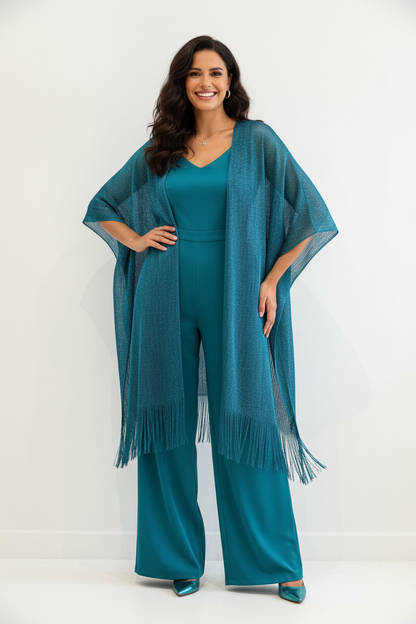  capa kimono turquesa con flecos- look de fiesta