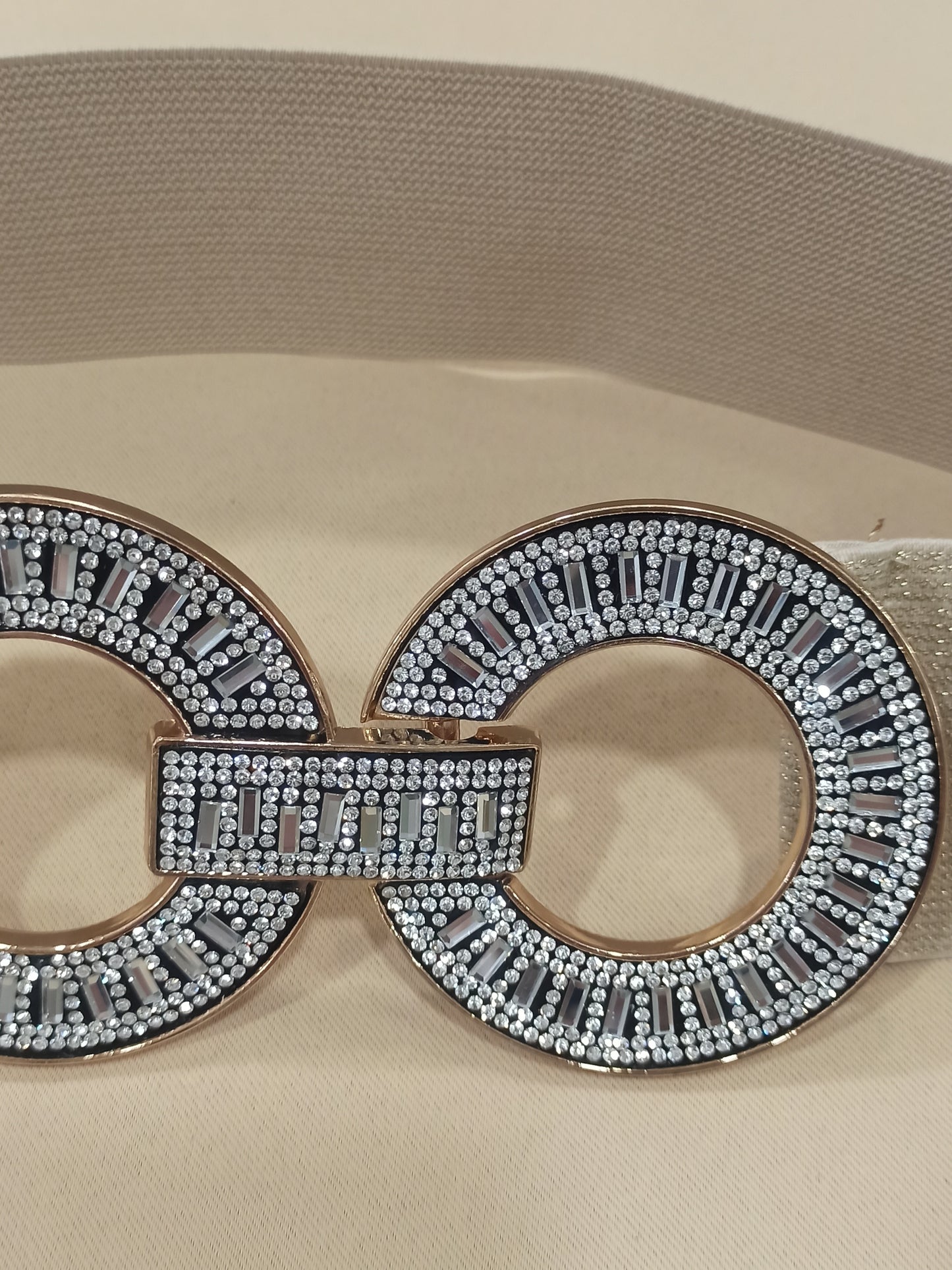 Cinturón elástico dorado con hebilla de strass doble círculo