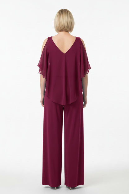 espalda mono elegante con capa de tul y tirantes de lentejuelas magenta