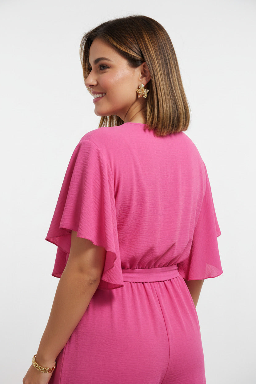 espalda mono largo con manga de volante color fucsia