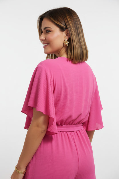 espalda mono largo con manga de volante color fucsia