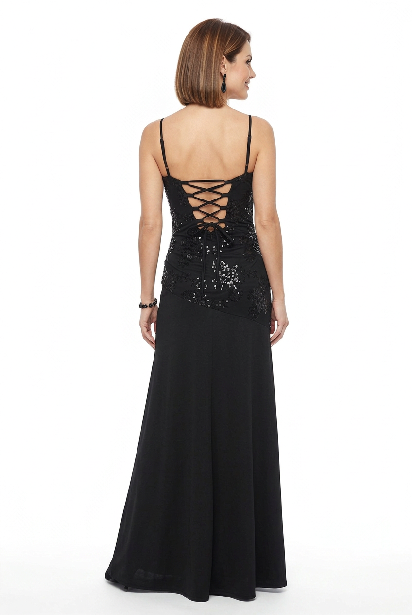 espalda vestido de fiesta largo negro con lentejuelas y chal