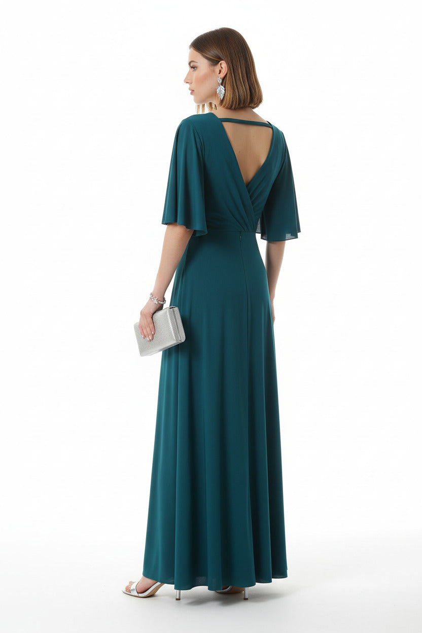 espalda vestido de fiesta largo verde azulado con manga corta y nudo cruzado en el escote 