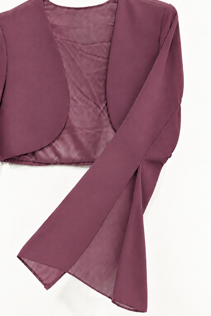 Detalle de manga campana de torera de gasa magenta