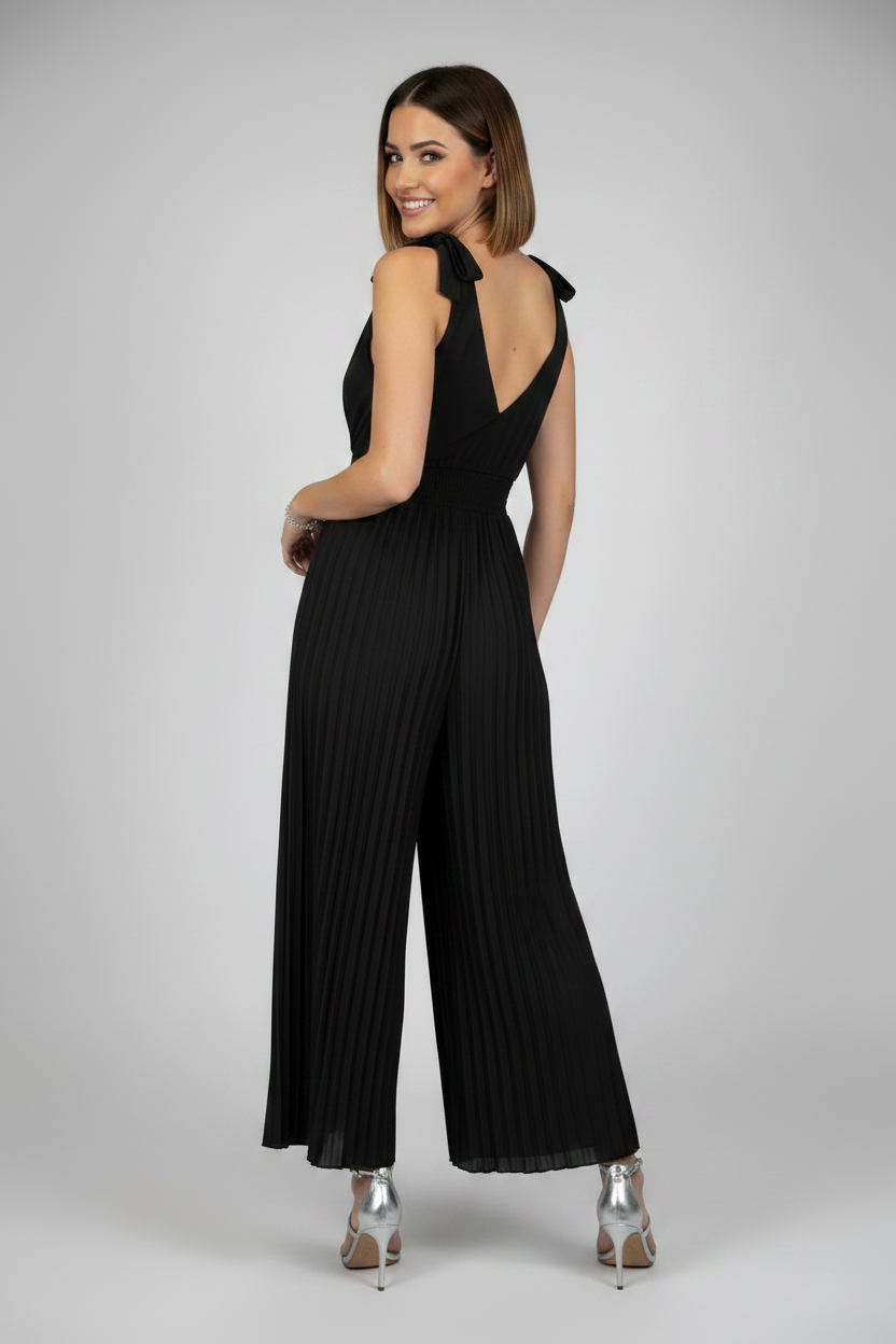 mono de vestir con escote pico y pantalón palazzo negro espalda
