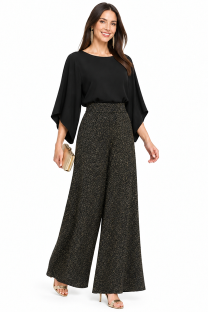 Pantalón palazzo jaspeado con brillo dorado sobre modelo, vista frontal