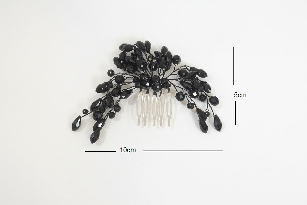 Peineta con pedrería negra