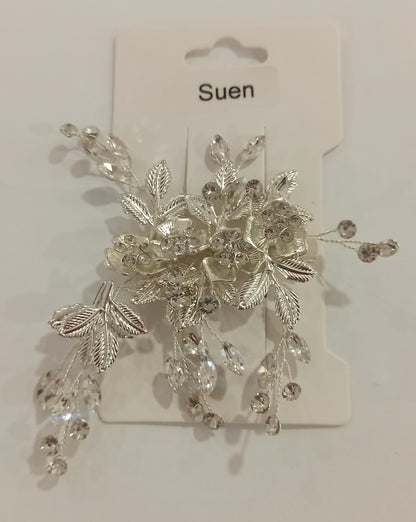 Pinza floral plateada con pedrería