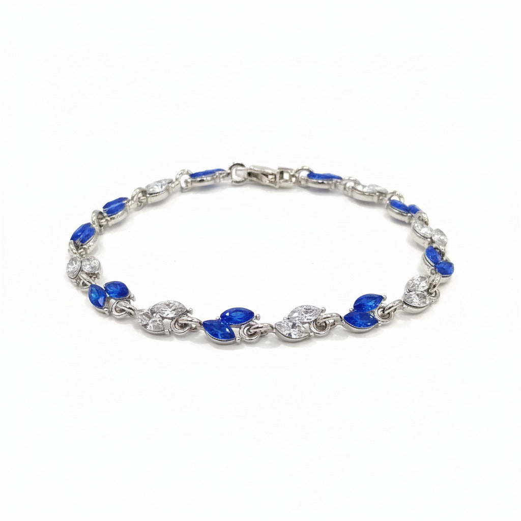 Pulsera plateada con pedrería azul