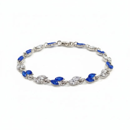 Pulsera plateada con pedrería azul