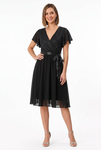 vestido de fiesta negro corto con vuelo
