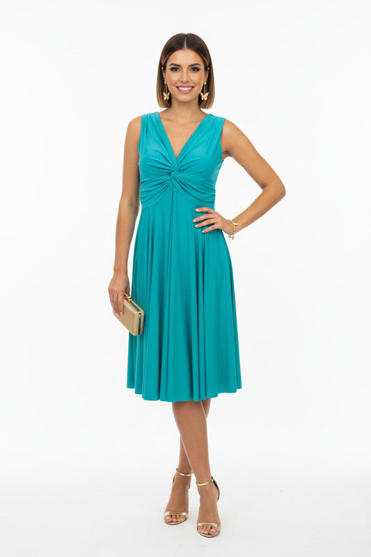 vestido de fiesta corto invitada  color turquesa con escote pico cruzado