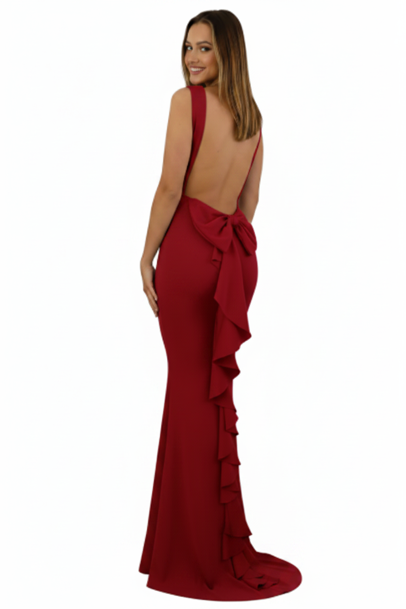 espalda vestido de fiesta sirena con espalda descubierta y lazo rojo