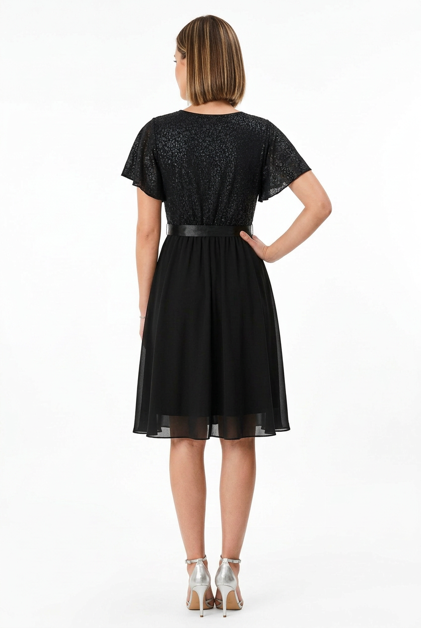 espalda vestido de fiesta negro corto con vuelo