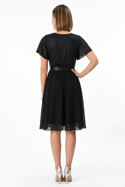 espalda vestido de fiesta negro corto con vuelo